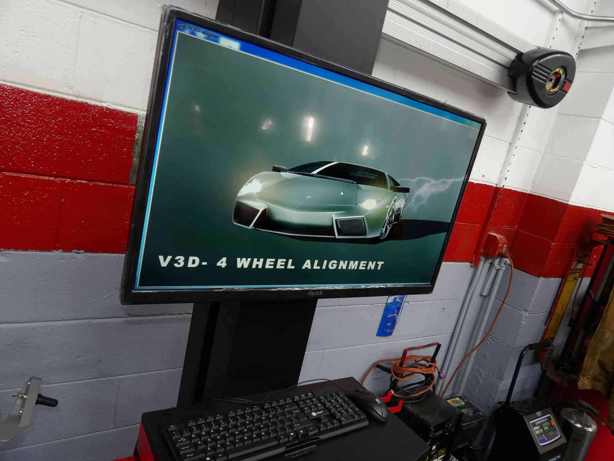 State-of-the-art V3D 4-wheel alignment system at Pulaski Automotive in Chicago, featuring advanced digital precision for optimal vehicle alignment and performance.